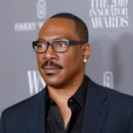 Image of actor Eddie Murphy with black glasses